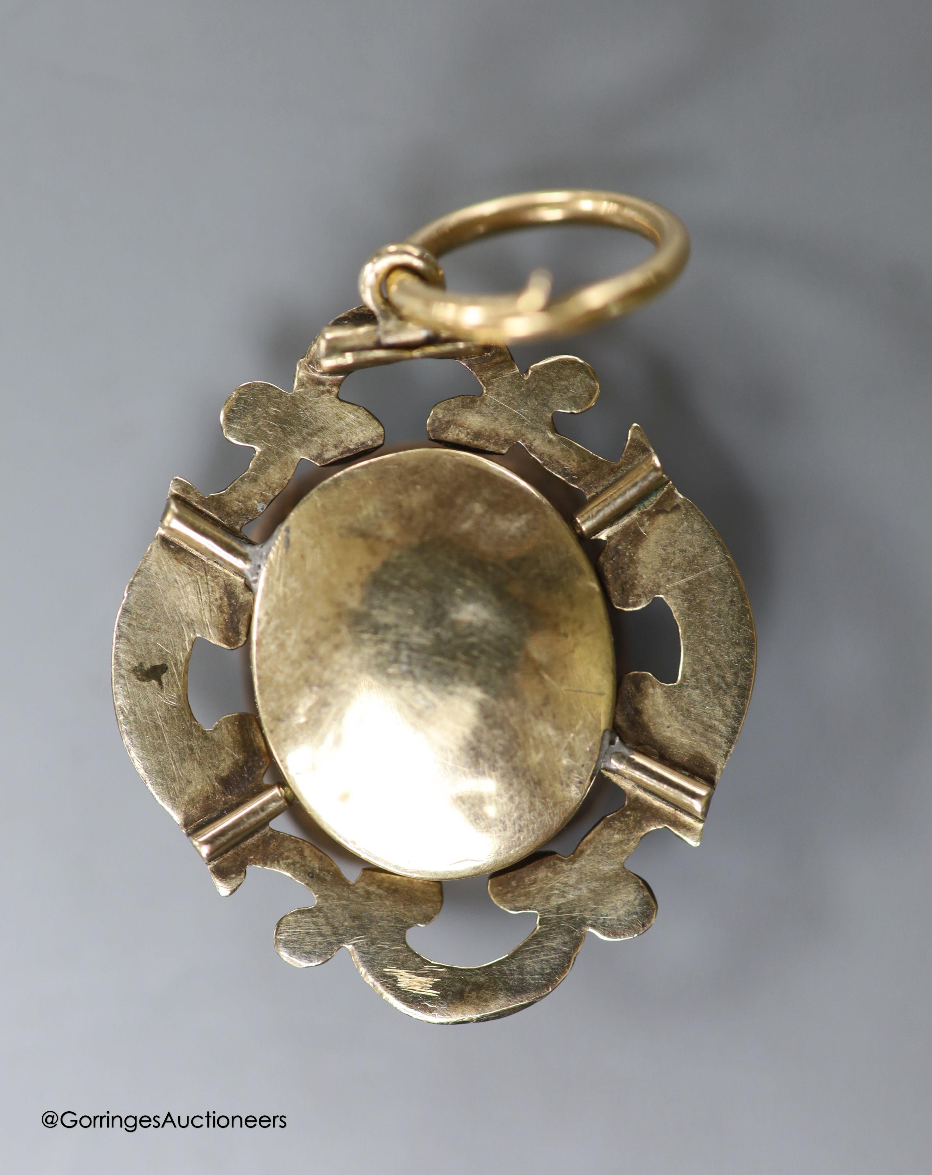 A late Victorian yellow metal foil backed? paste and seed pearl set pendant, 31mm, gross weight 8.5 grams.